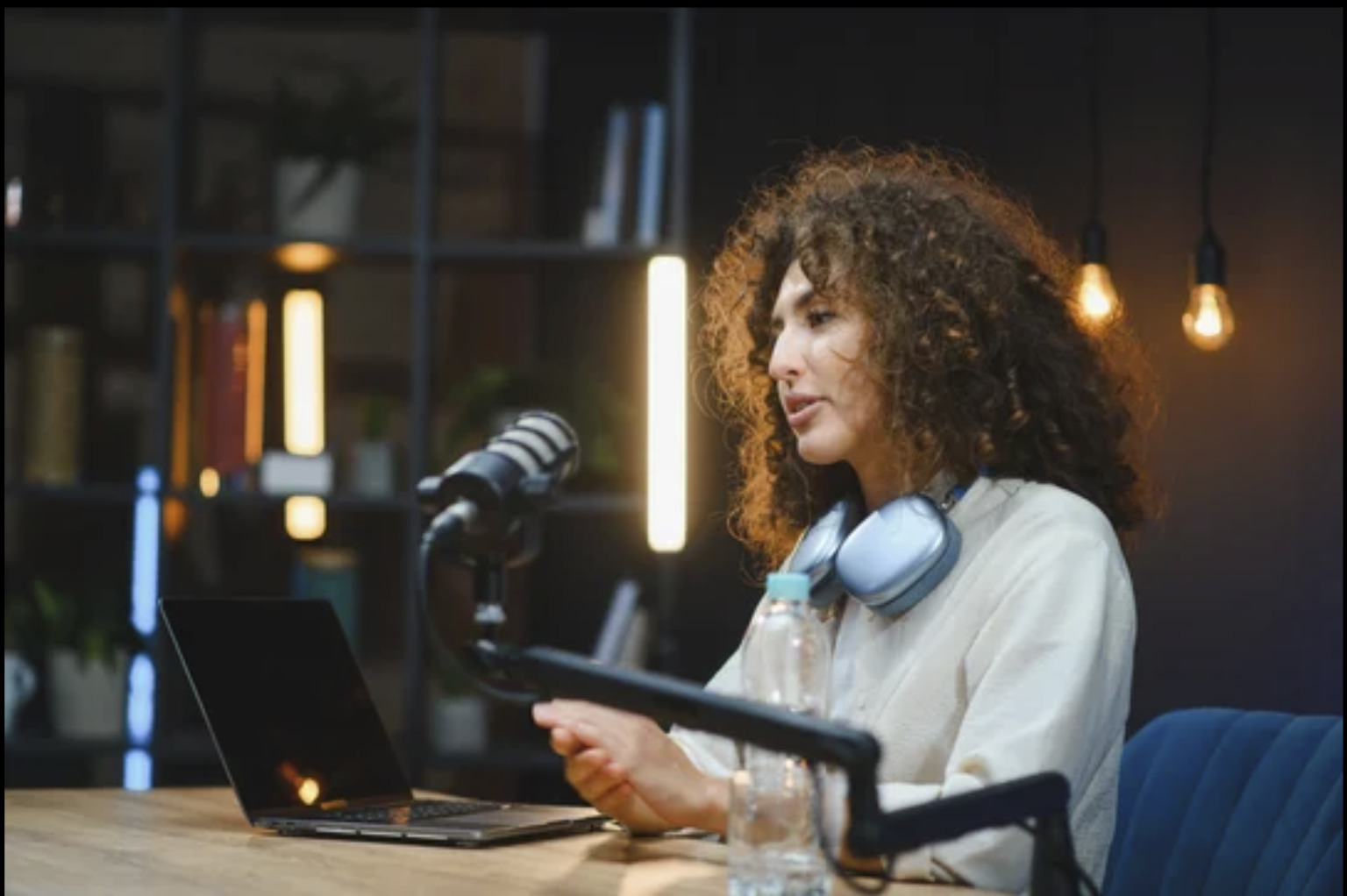 Course creator recording content at a desk